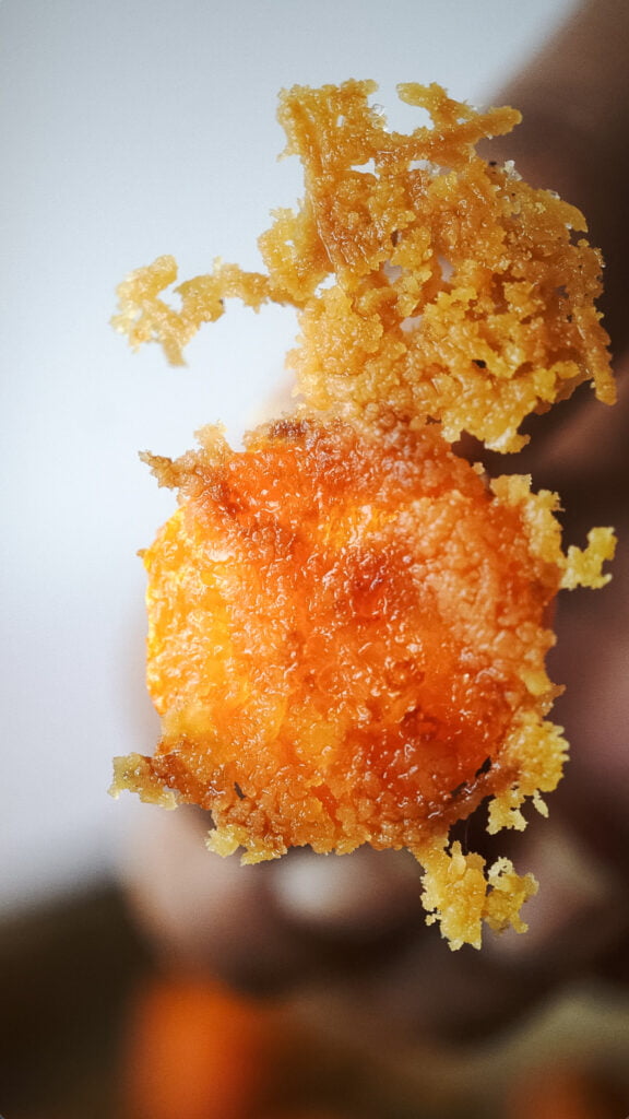 crispy parmesan cheese with baked carrots
